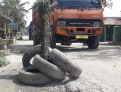 Mobilisasi Truk Tanah Rusak Jalan Wampu, PC SEMMI Langkat Minta APH Usut Perizinan Galian C