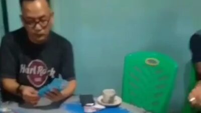 Viral, Video Mirip Pj Bupati Kampar Yang Diduga Asyik Bermain Judi Kartu Tersebar