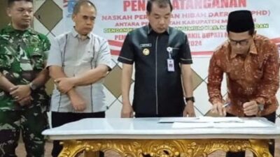 Pj Bupati Merangin Teken NPHD dengan KPU