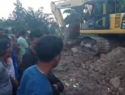 Perbaiki Jalan Rusak di Batang Masumai, Pj Bupati Merangin Turunkan Alat Berat